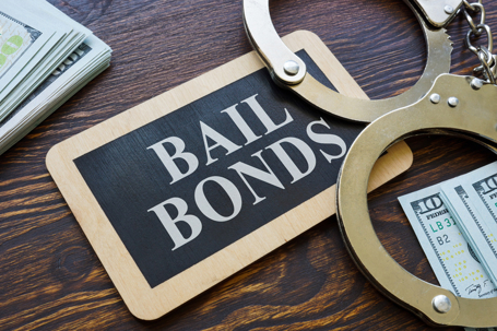 bail bonds and handcuffs